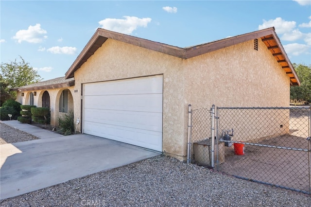 view of home's exterior with a garage