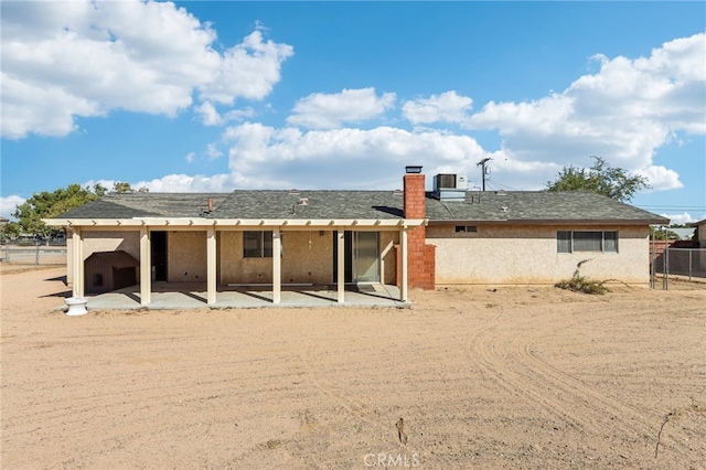 back of house featuring a patio area and central AC