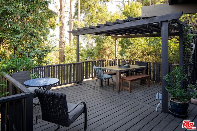 wooden terrace featuring a pergola