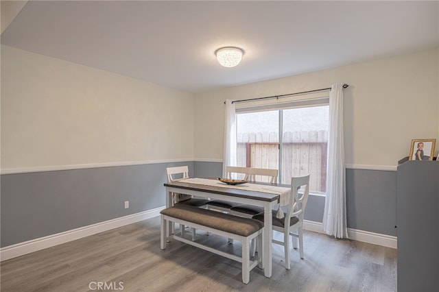 dining area featuring hardwood / wood-style flooring