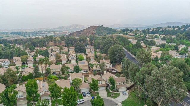 drone / aerial view featuring a mountain view