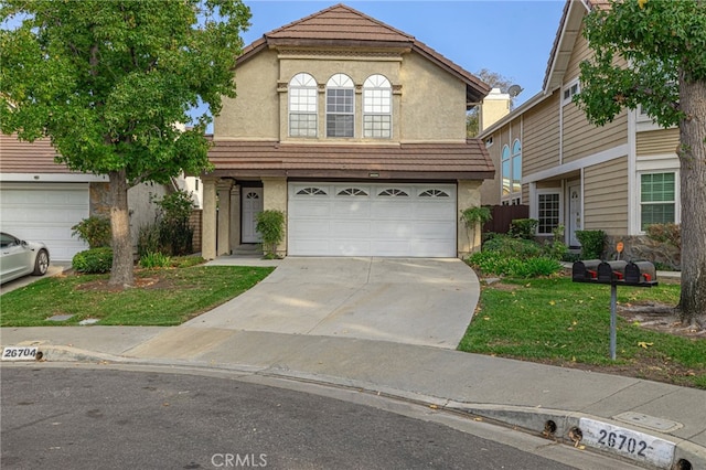 front of property featuring a garage