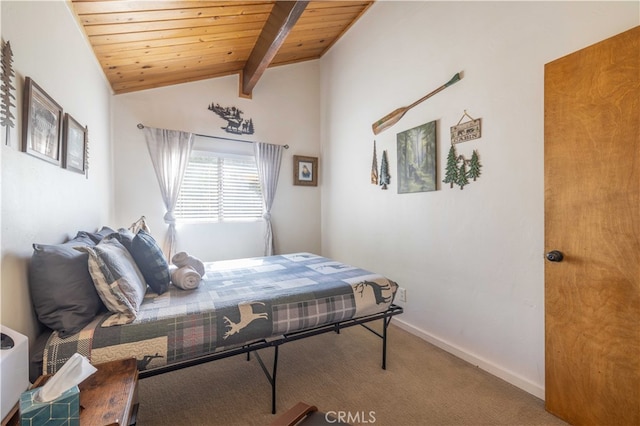 carpeted bedroom with lofted ceiling with beams and wooden ceiling