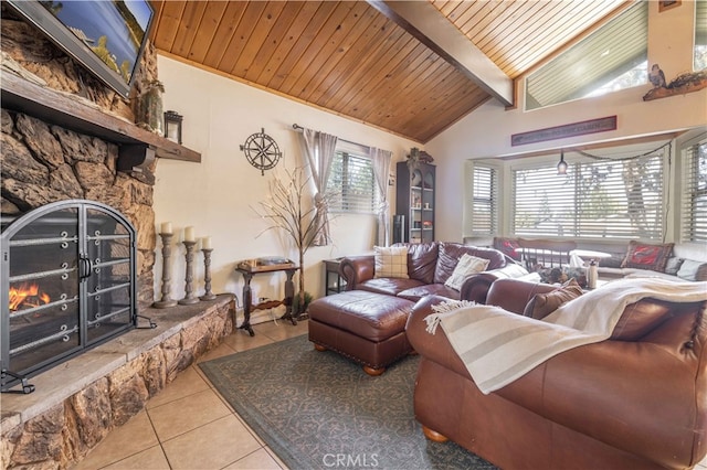 tiled living room featuring a stone fireplace, wood ceiling, lofted ceiling with beams, and a wealth of natural light