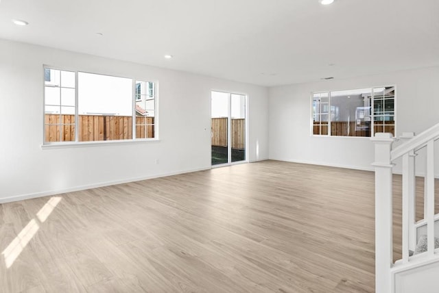 unfurnished room featuring light hardwood / wood-style floors