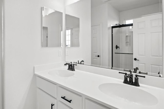 bathroom featuring vanity and walk in shower