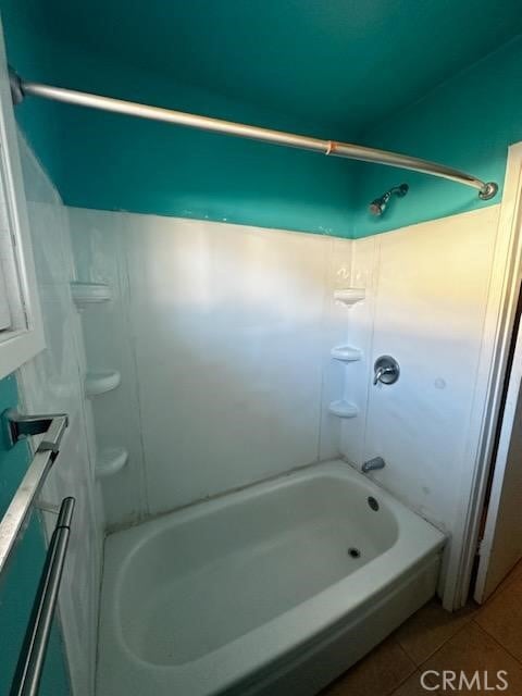 bathroom featuring  shower combination and tile patterned flooring