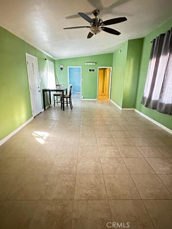 4772 Cebrian, New Cuyama, CA 93254 - empty room featuring a ceiling fan and vaulted ceiling