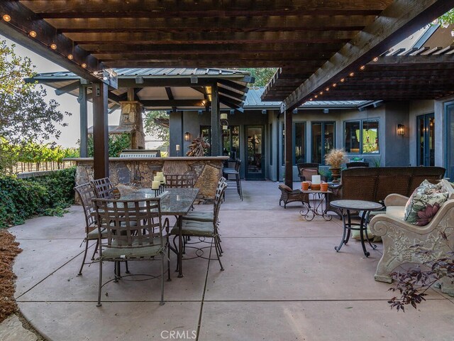 view of patio featuring a pergola