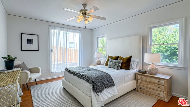 bedroom featuring ceiling fan and wood-type flooring