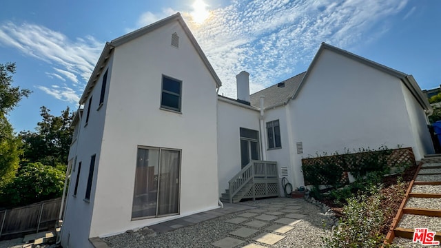 rear view of house with a patio area