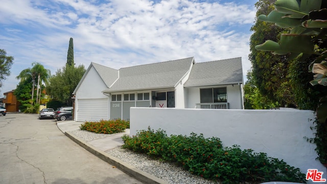 exterior space with a garage