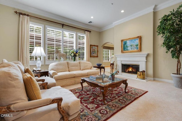 carpeted living room with ornamental molding and a healthy amount of sunlight