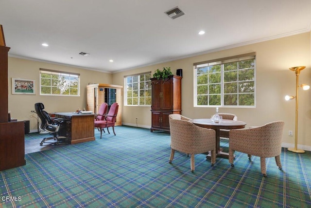 dining area featuring ornamental molding, carpet floors, and plenty of natural light