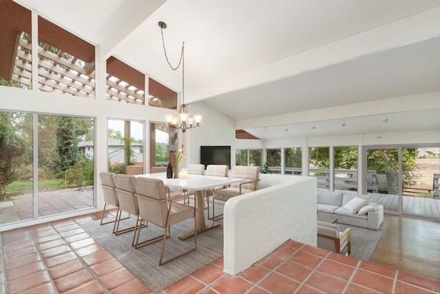 sunroom / solarium featuring vaulted ceiling with beams and an inviting chandelier