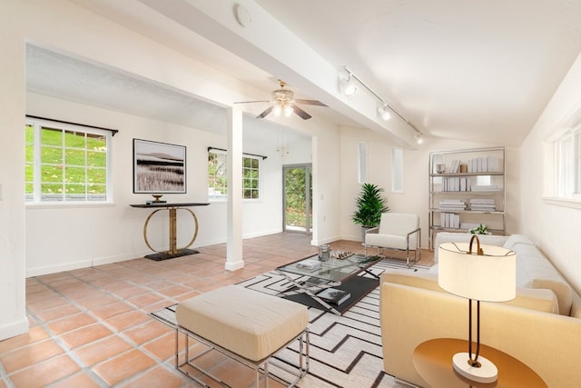 living room featuring track lighting, tile patterned floors, and ceiling fan