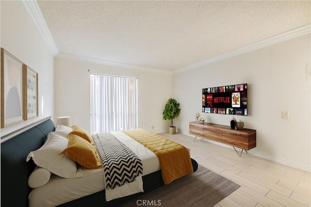 bedroom with light hardwood / wood-style floors, a textured ceiling, and ornamental molding