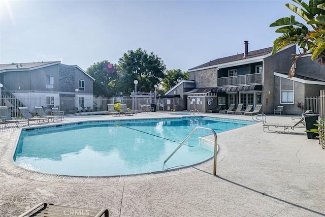 view of pool featuring a patio