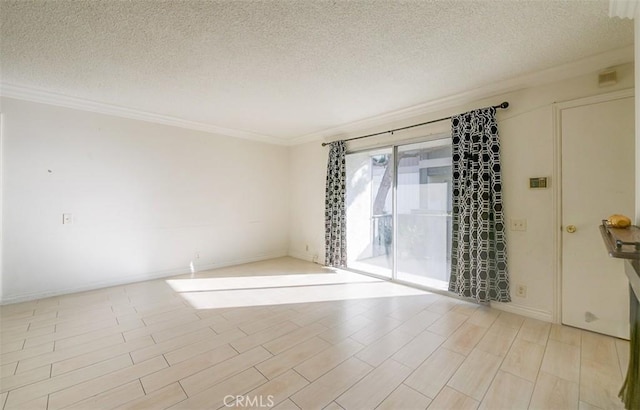 empty room featuring light hardwood / wood-style flooring, ornamental molding, and a textured ceiling