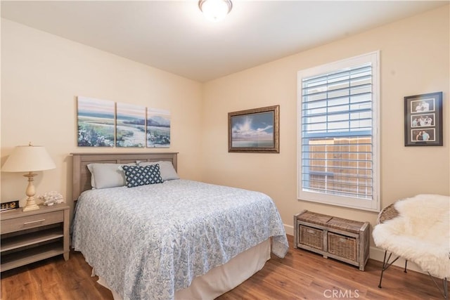 bedroom featuring hardwood / wood-style flooring