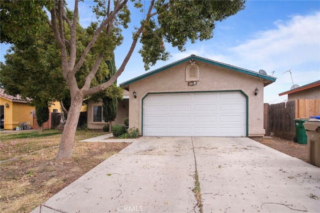 ranch-style house featuring a garage