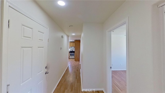 hallway featuring light hardwood / wood-style floors