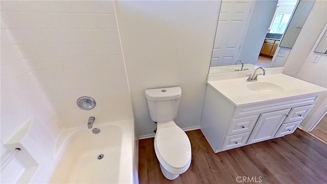 full bathroom featuring toilet, shower / washtub combination, vanity, and wood-type flooring