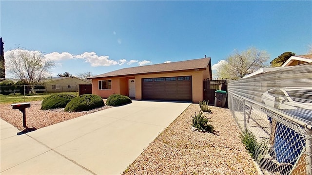 ranch-style home with a garage