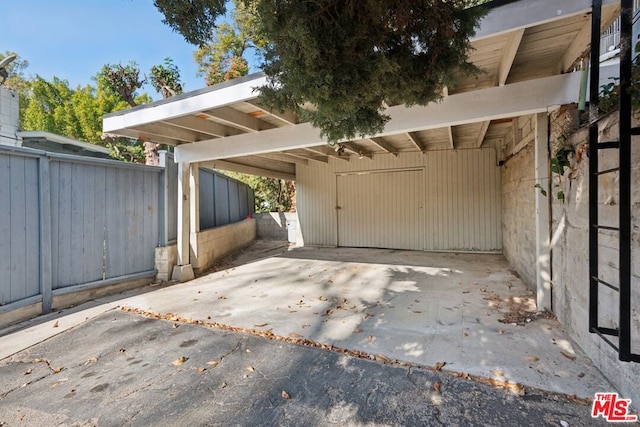 view of car parking featuring a carport