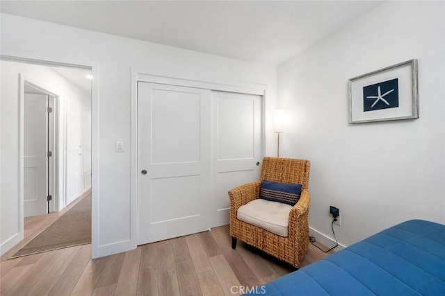 living area with wood-type flooring