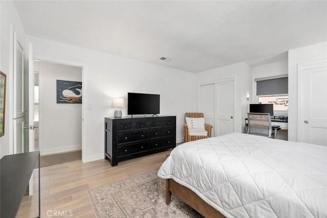 bedroom with light hardwood / wood-style floors