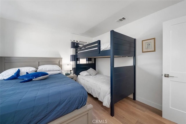 bedroom featuring hardwood / wood-style flooring