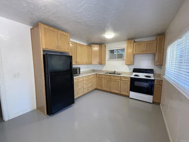 kitchen with black refrigerator, electric range, light brown cabinets, and sink