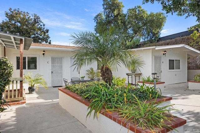 view of front of property with a patio