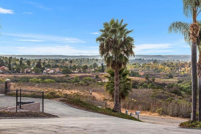 view of home's community with a water and mountain view