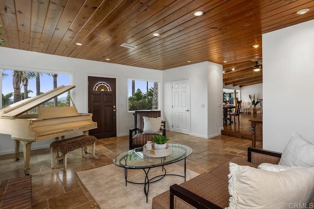 living area with wooden ceiling