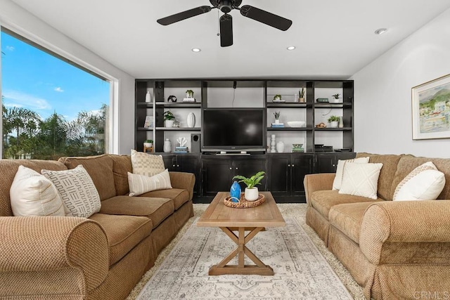 living room with ceiling fan