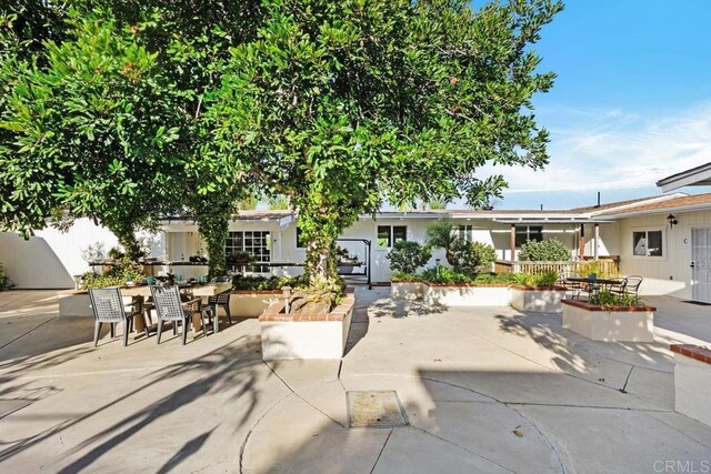 view of front of home with a patio