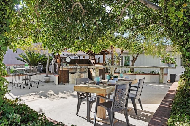 view of patio featuring a bar