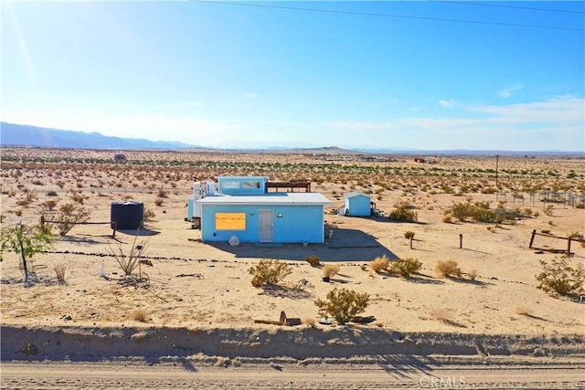 exterior space featuring a mountain view