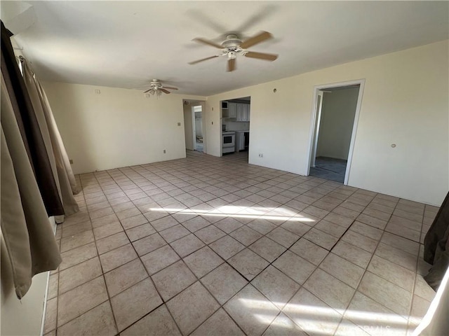 spare room with ceiling fan