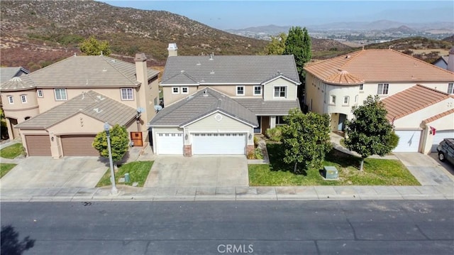 view of front of property with a mountain view