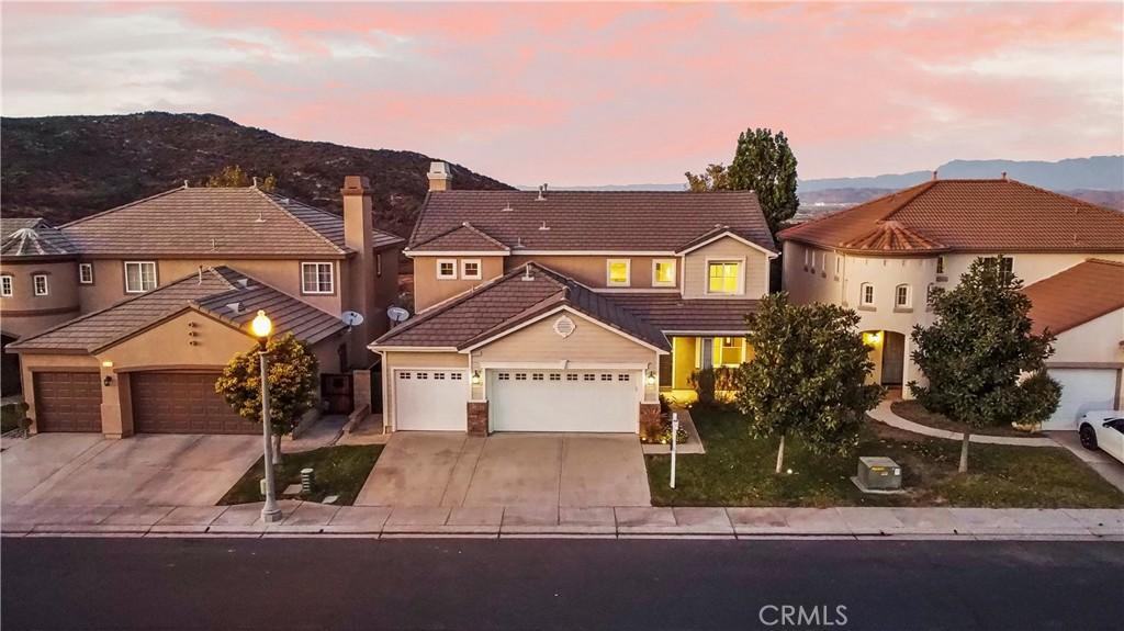 view of front of house featuring a mountain view and a garage