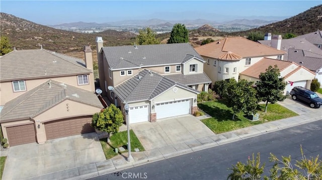 bird's eye view with a mountain view