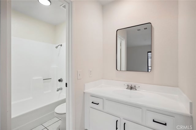 full bathroom featuring vanity, shower / washtub combination, toilet, and tile patterned flooring