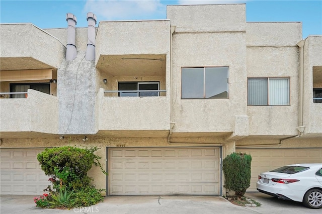 view of property featuring a garage