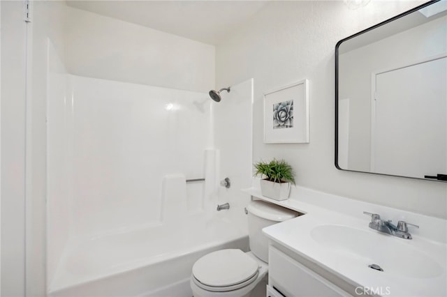 full bathroom with vanity, shower / washtub combination, and toilet