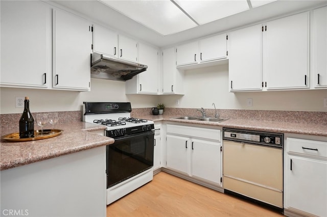 kitchen with dishwashing machine, sink, white range with gas cooktop, white cabinets, and light hardwood / wood-style floors