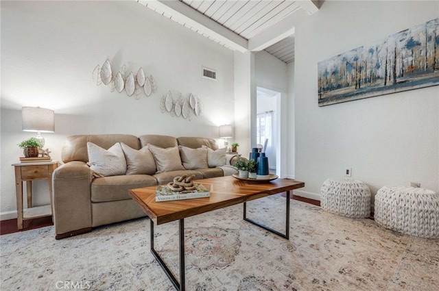 living room featuring hardwood / wood-style floors, lofted ceiling with beams, and wood ceiling