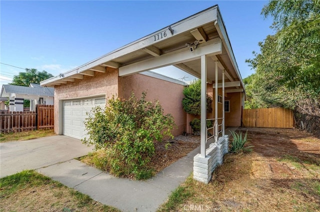 view of side of property featuring a garage